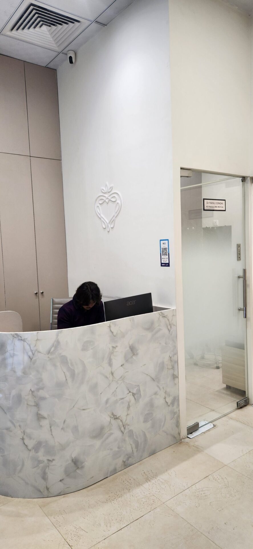 Nirvana Clinic reception desk at Sun Twilight Mall Greater Noida — appointment booking and patient check-in